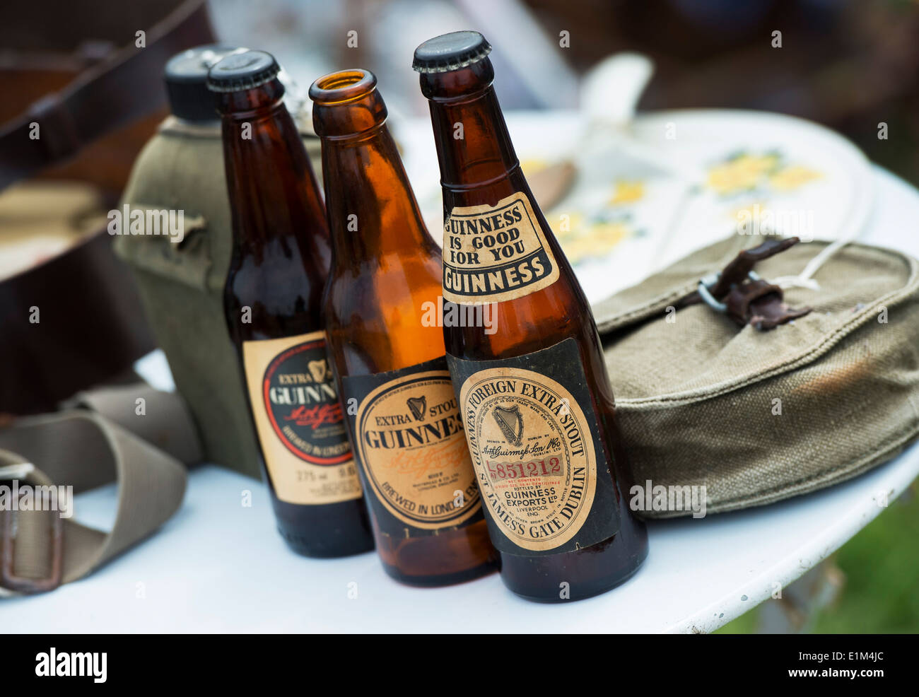 Three old Guinness Bottles Stock Photo