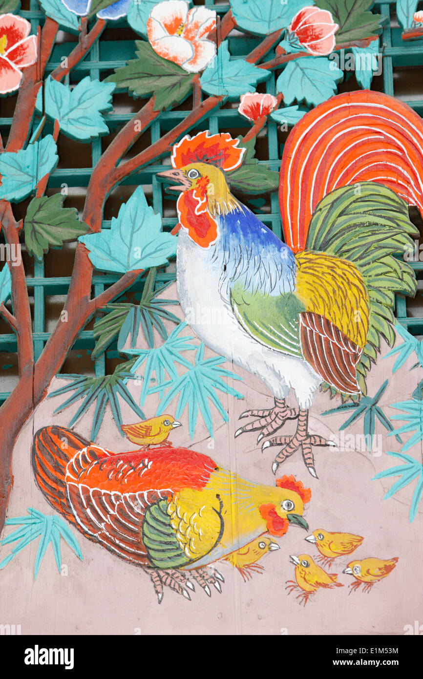 Rooster, hen and chicks Stock Photo