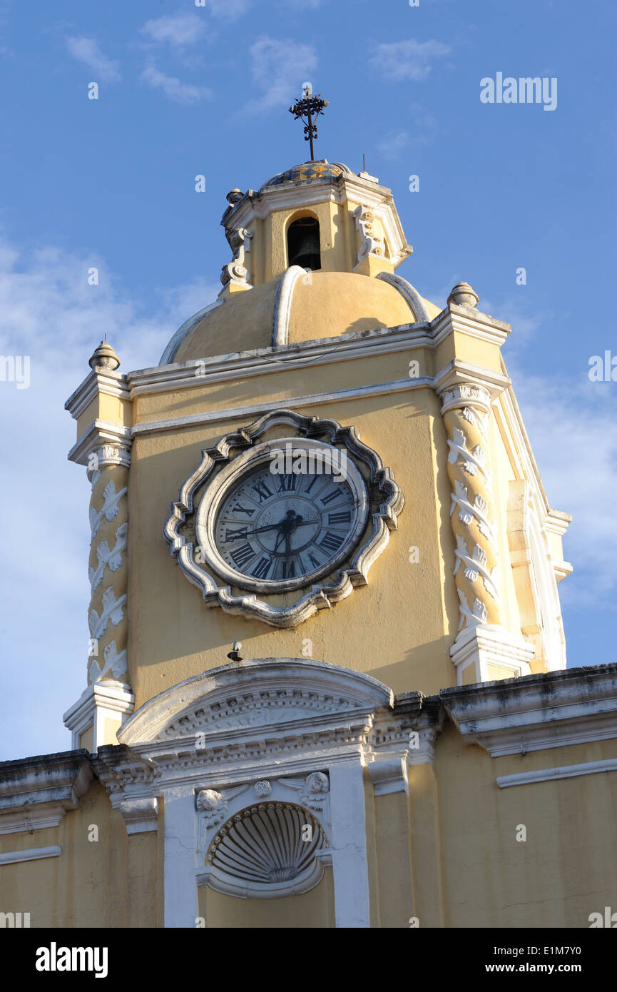Clock tower on the top of Arco de Santa Catalina, the Saint Catalina Arch, from the south.  Antigua Guatamala Stock Photo