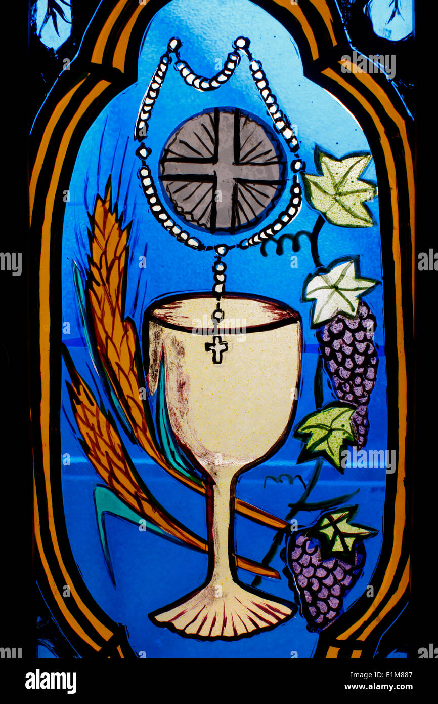 Christian symbols depicted on stained glass Stock Photo Alamy
