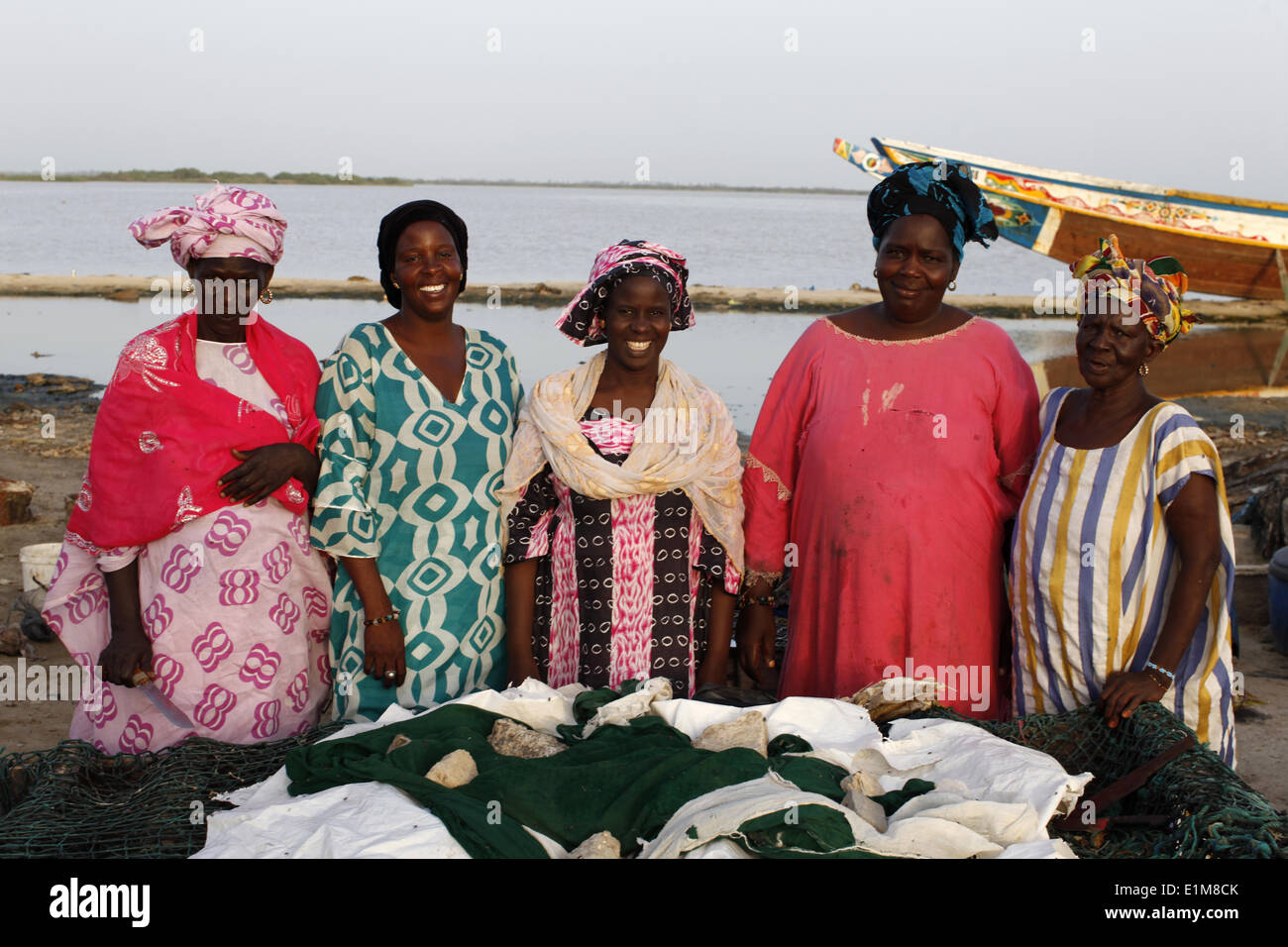 Cooperative of women who work in a fish processing business financed with loans from a microcredit institution Stock Photo