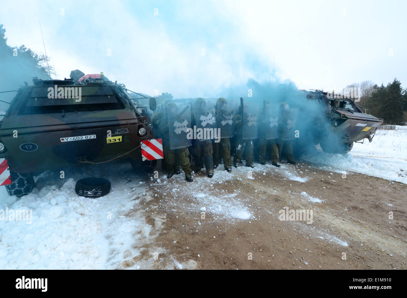 German soldiers conduct crowd riot control operations during the Kosovo ...