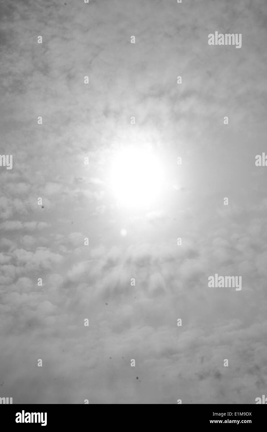 sun rise with hazy clouds in black and white Stock Photo - Alamy