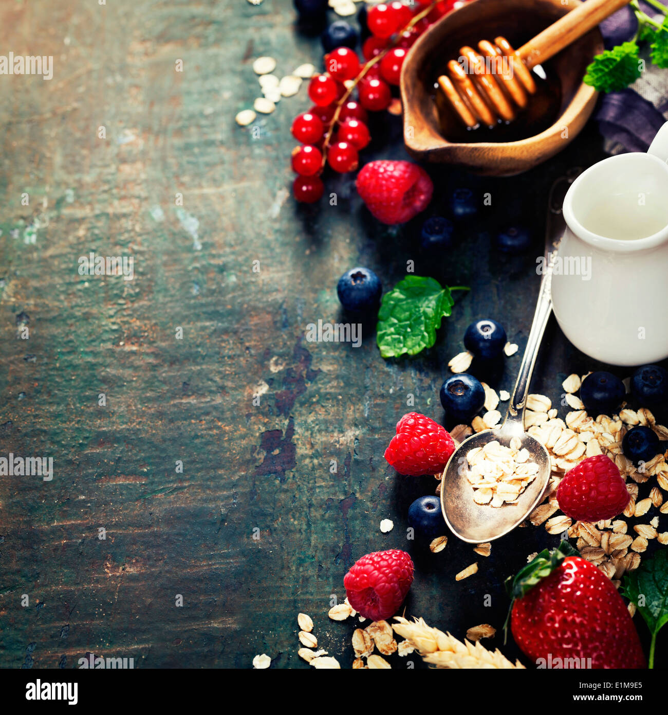 Healthy Breakfast.Oat flake, berries and fresh milk. Health and diet concept Stock Photo