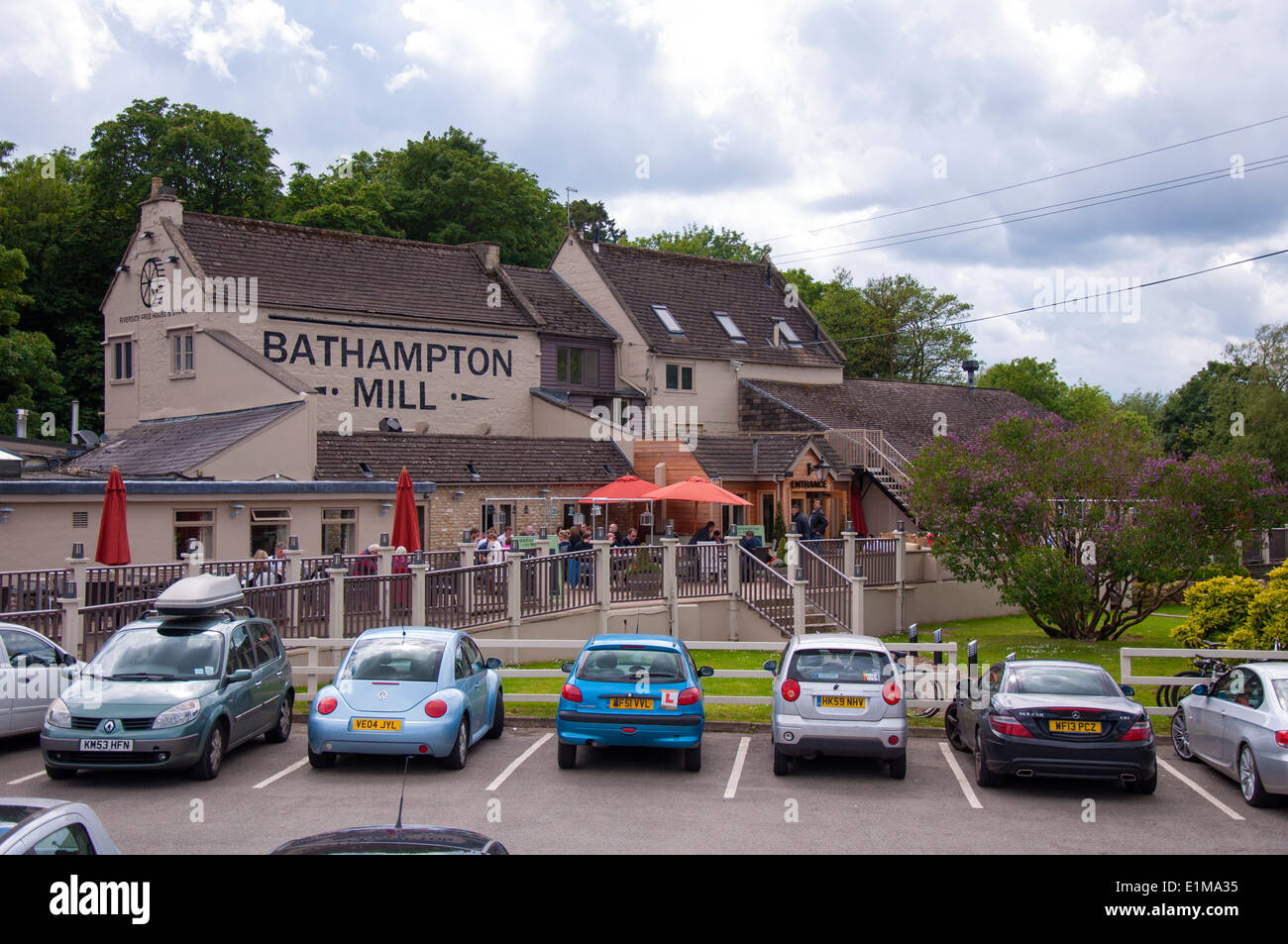 Cars parked at Bathampton Mill a pub restaurant in Bathampton near Bath Somerset England UK Stock Photo