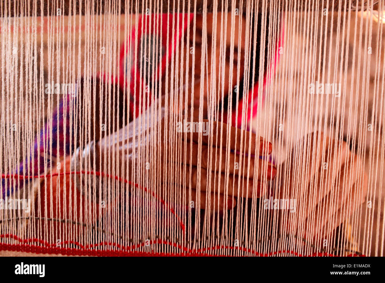 Carpet weaver at work Stock Photo Alamy
