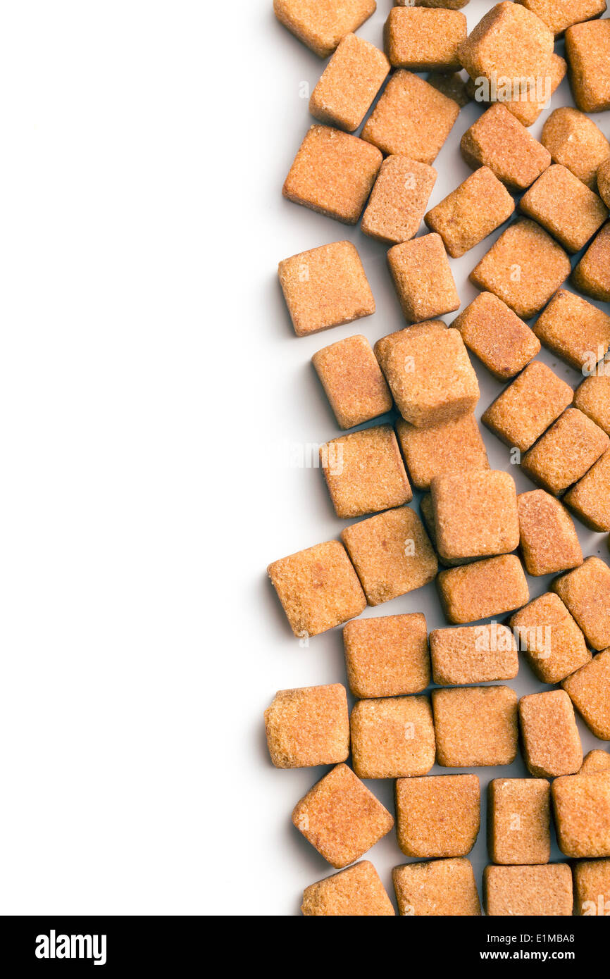 brown sugar cubes on white background Stock Photo