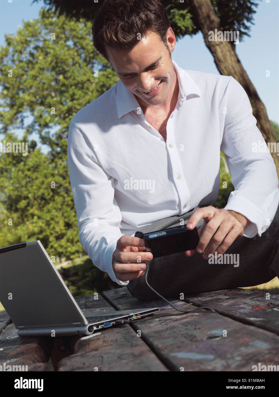 Business person smiling outdoor hi-res stock photography and images - Alamy