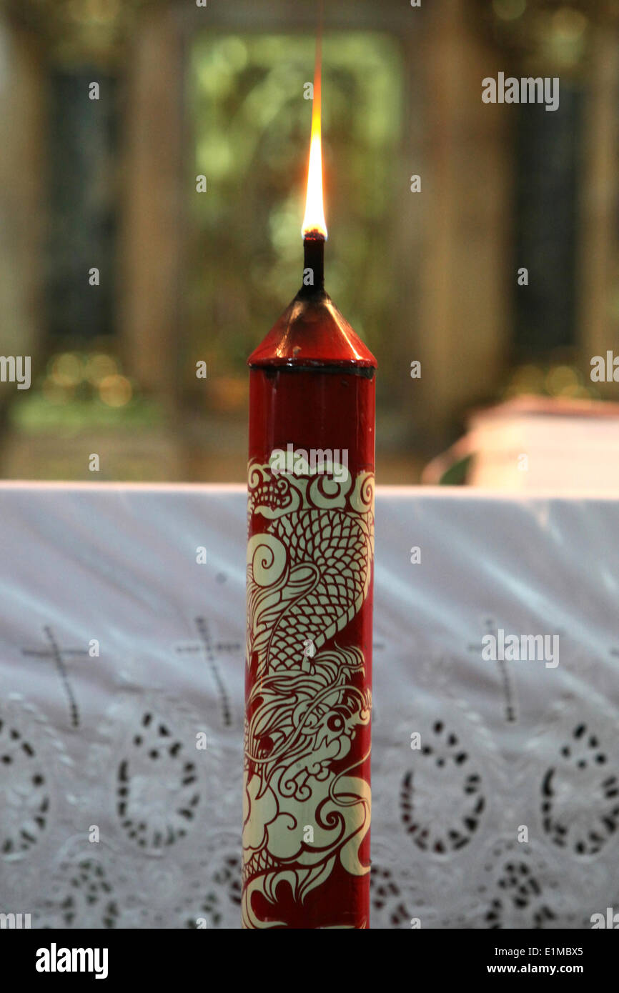 Vietnamese candle in a church Stock Photo Alamy