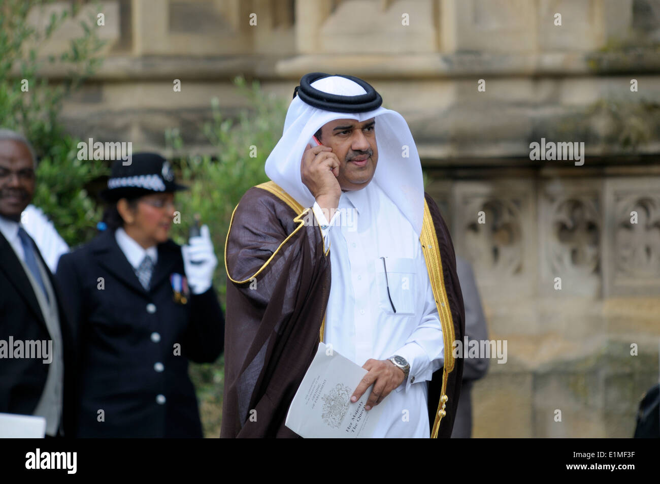 Khalid bin Rashid bin Salim Al-Hamoudi Al-Mansouri - Qatari Ambassador to London - talking on his mobile phone Stock Photo