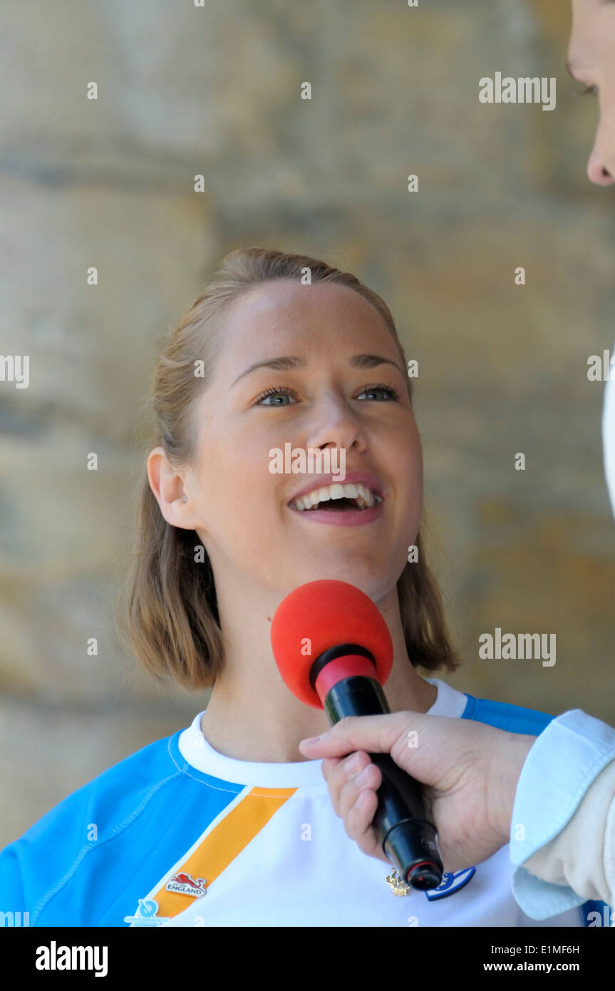 Lizzy Yarnold - Winter Olympic gold medalist in the skeleton, Sochi 2014 - being interviewed at the Queen's Baton Relay, 2014 Stock Photo