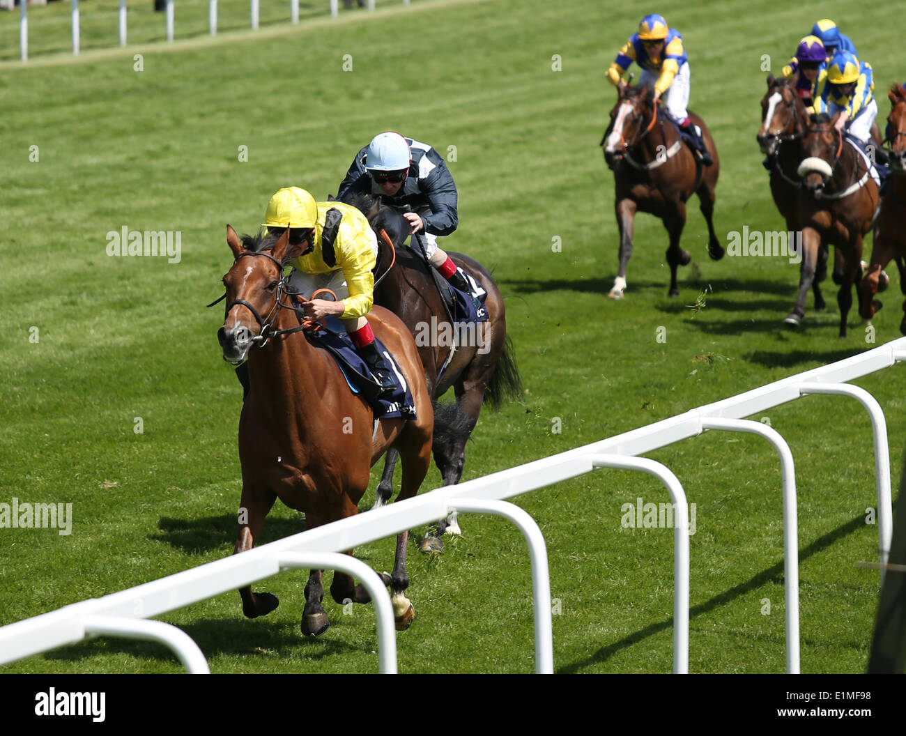 Epsom, UK. 06th June, 2014. Farraaj under Andrea Atzeni wins The Investec Wealth &amp; Investment Stakes during Ladies Day of the 2014 Epsom Derby Festival. Credit:  Action Plus Sports/Alamy Live News Stock Photo