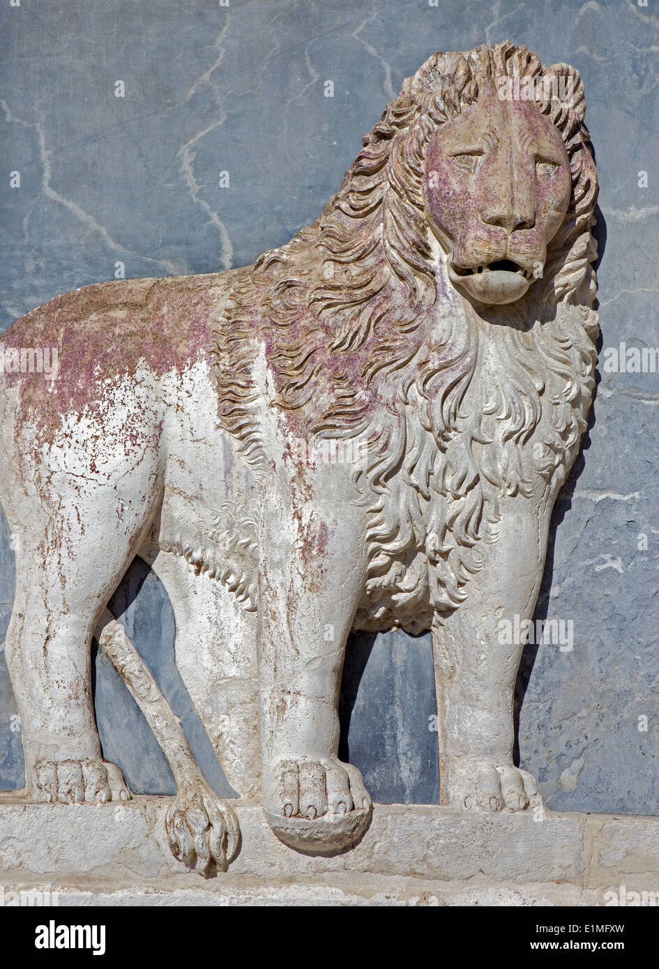 Venice - Relief of lion on the facade of Scuola Grande di San Marco. Stock Photo