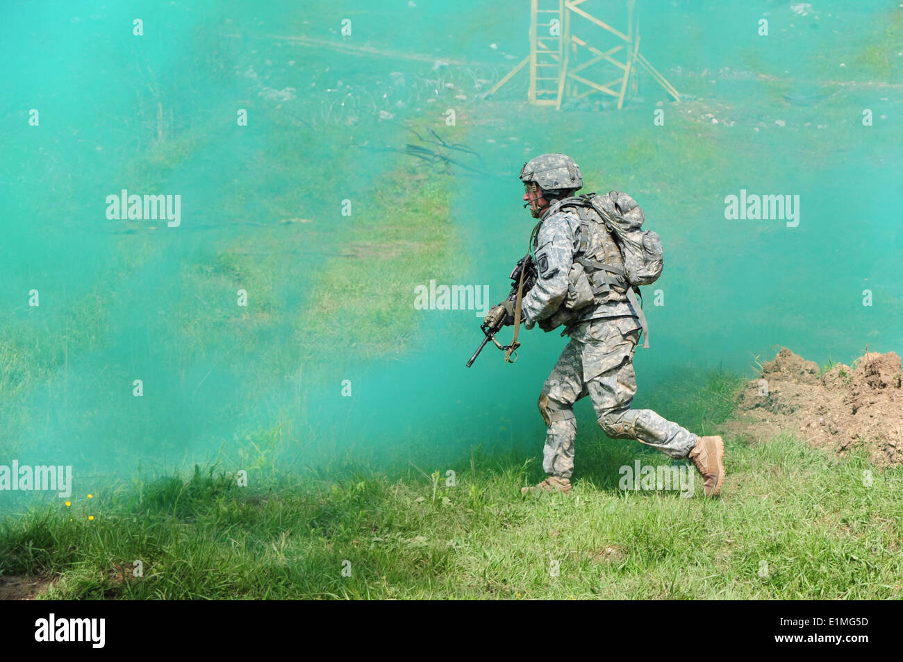 A U.S. Army paratrooper assigned to Battle Company, 2nd Battalion, 503rd Infantry Regiment, 173rd Airborne Brigade Combat Team Stock Photo