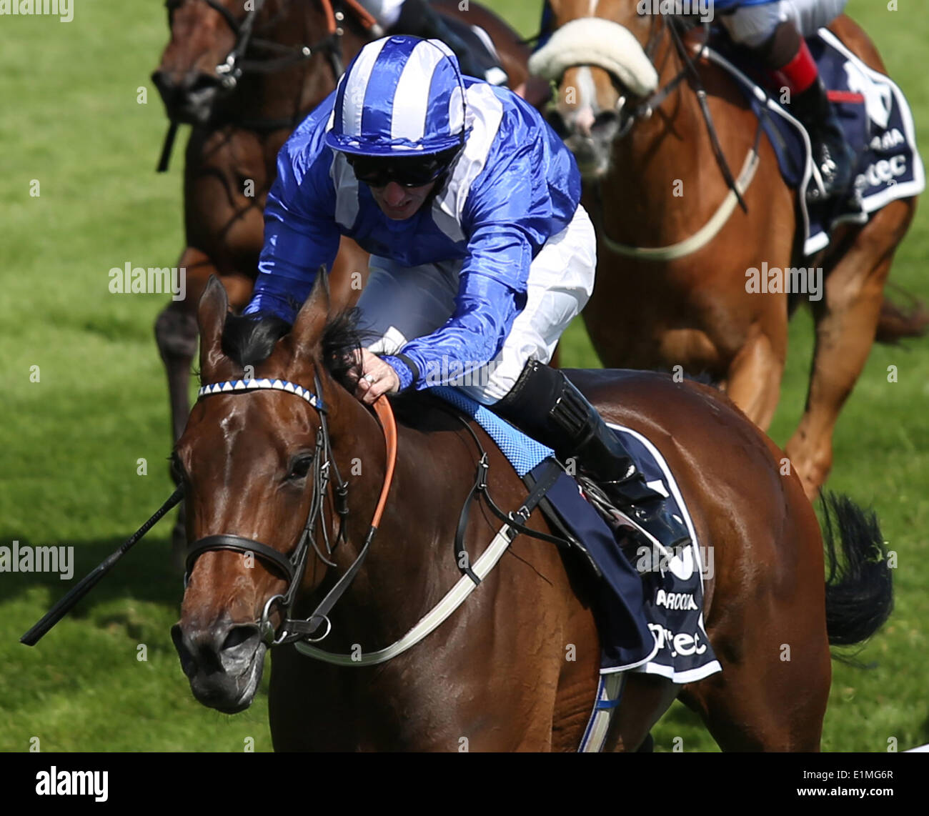 Epsom, UK. 06th June, 2014. Taghrooda under Paul Hanagan wins The Investec Oaks during Ladies Day of the 2014 Epsom Derby Festival. Credit:  Action Plus Sports/Alamy Live News Stock Photo