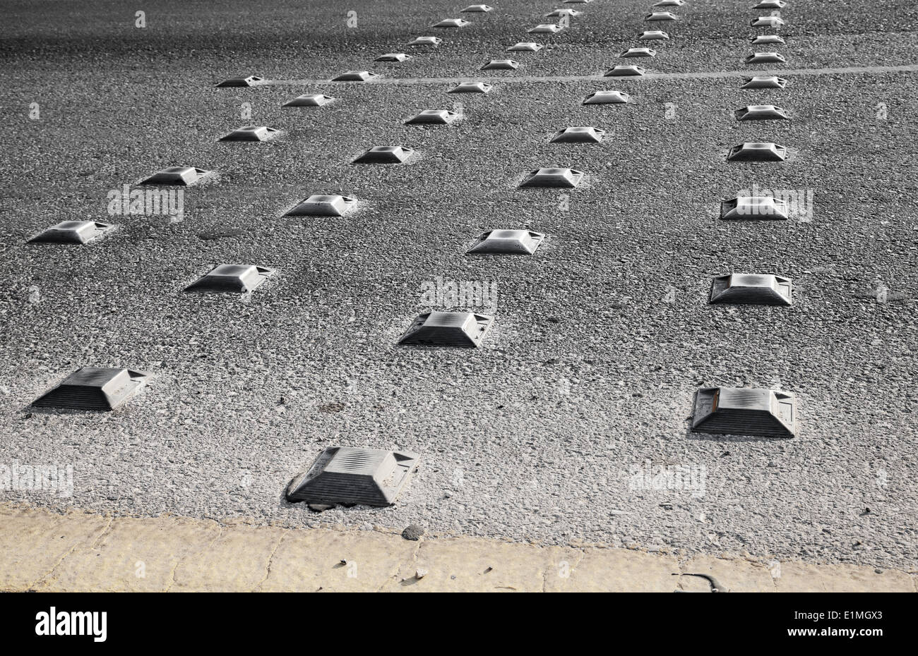 Metal road studs on the asphalt highway Stock Photo Alamy