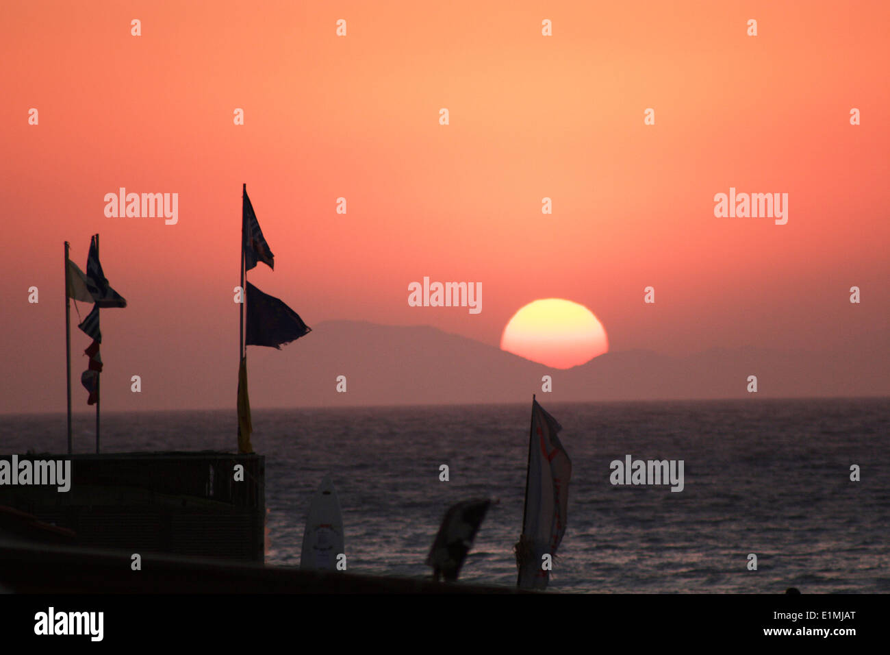 Sunset on the beach Rhodes Island, Ialyssos Rhodes, East Coast, Greece Stock Photo