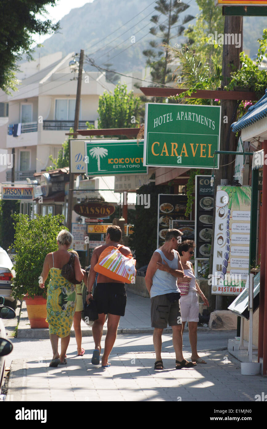 People exploring the local shops in Rhodes Island, Ixia Rhodes, East Coast, Greece Stock Photo