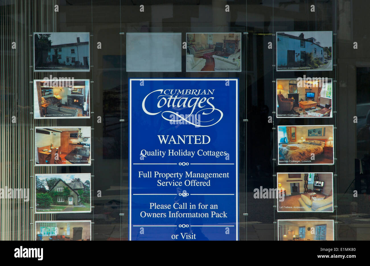 Window of estate agent (Cumbrian Cottages), Windermere, Lake District