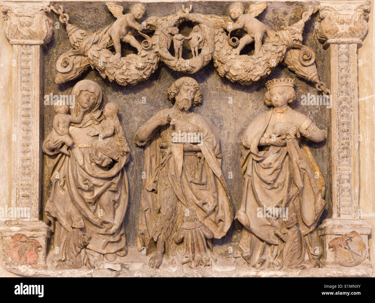 Vienna - Stone relief from back side of Church of the Teutonic Order or Deutschordenkirche - saints Stock Photo
