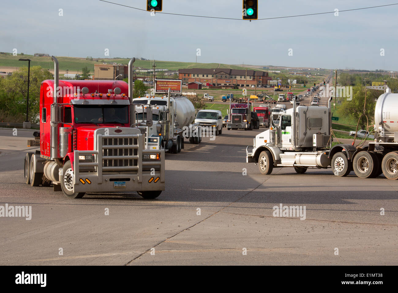 Watford City, North Dakota - Oil service trucks clog the streets of western North Dakota towns. Stock Photo