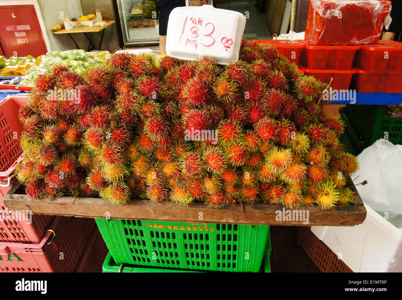 Rambutan (Nephelium lappaceum) in a stall in Malaysia Stock Photo