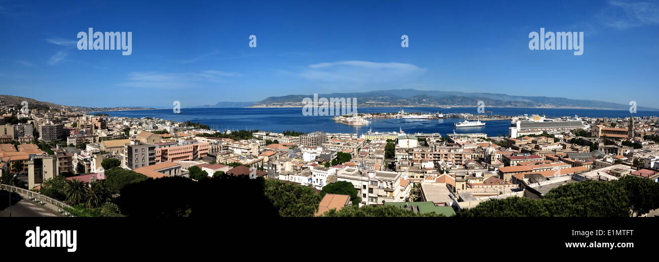The city of Messina and the Strait of Messina on background Stock Photo
