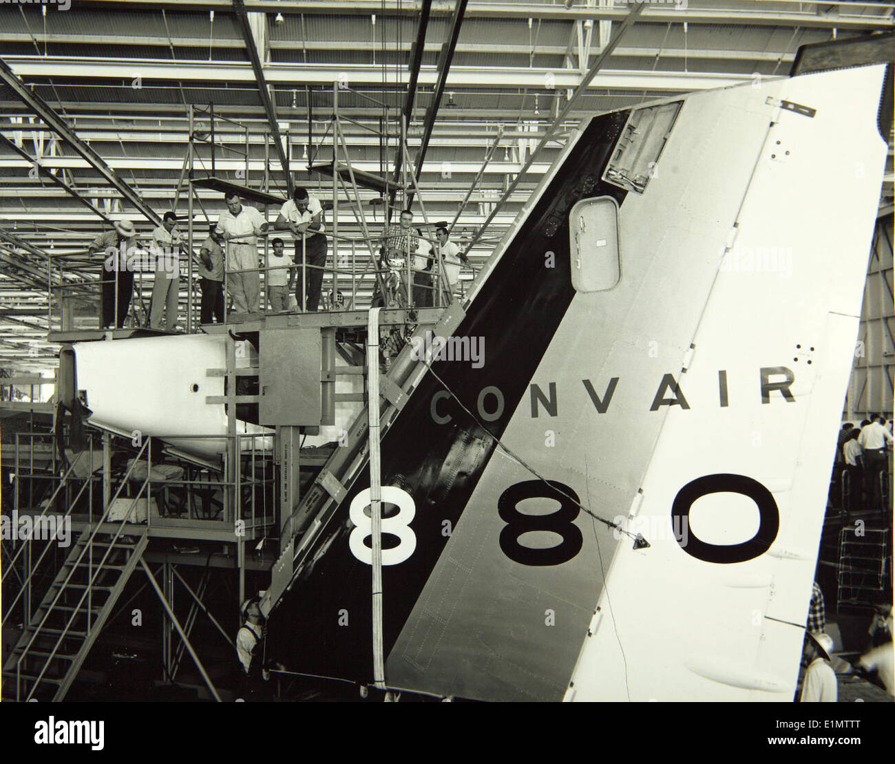 The Convair 880, N801TW, was an early jet airliner built for speed and efficiency. It was assembled at the Convair factory and represented the pinnacle of Convair's aircraft production during the 1950s, featuring a quadjet design and distinctive tailfin. Stock Photo