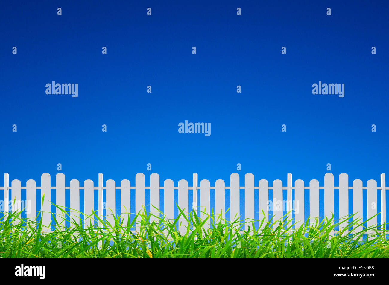 white fence and green grass Stock Photo - Alamy