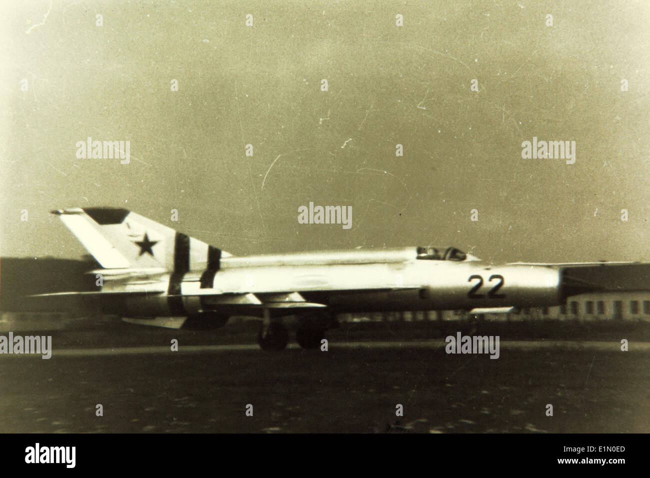 The MiG-21, known by NATO as 'Fishbed,' was a Soviet-era fighter aircraft. It became one of the most widely used jet fighters globally and played a pivotal role in numerous Cold War conflicts and air combat operations. Stock Photo