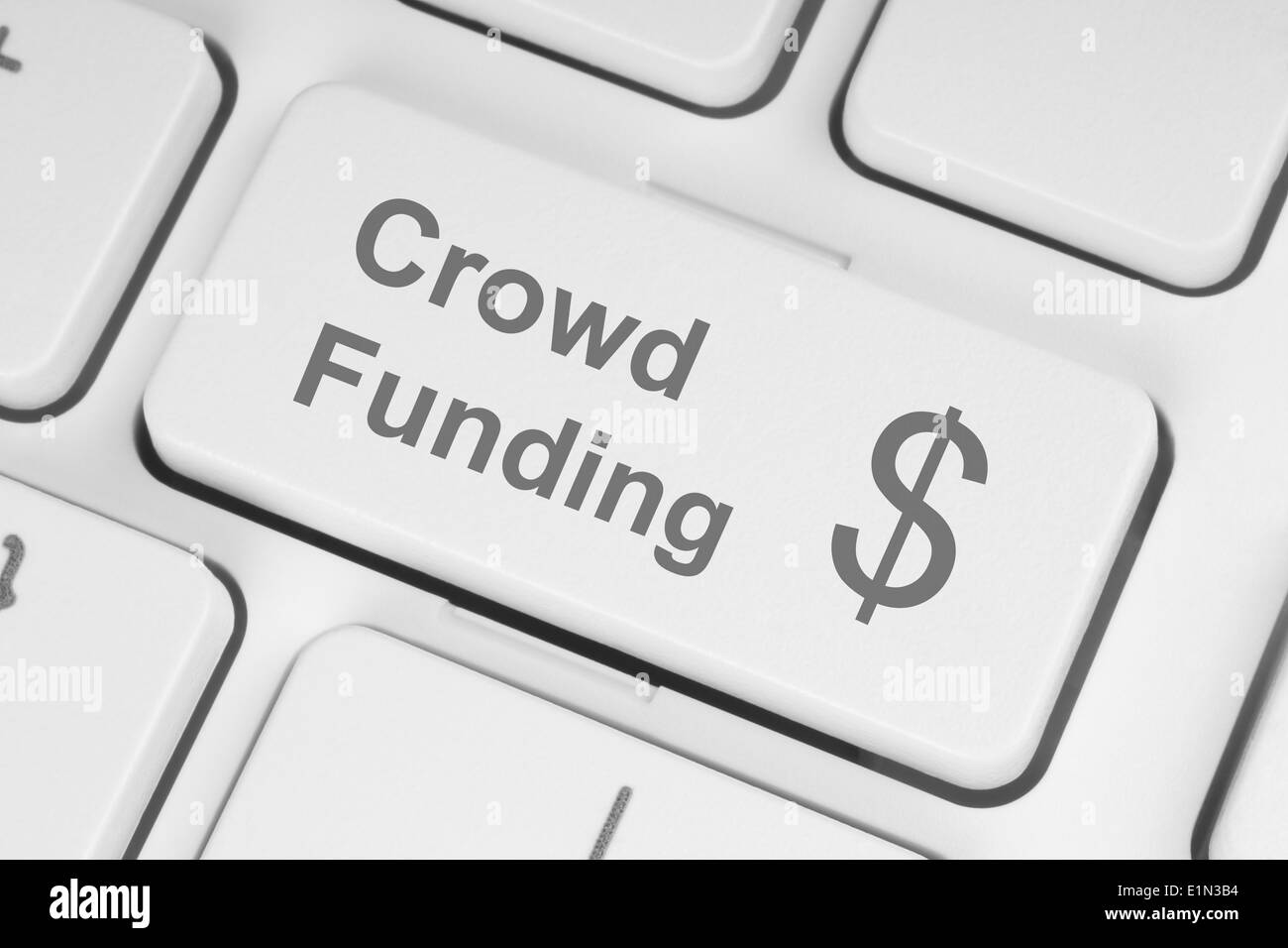 Crowd funding button on keyboard Stock Photo