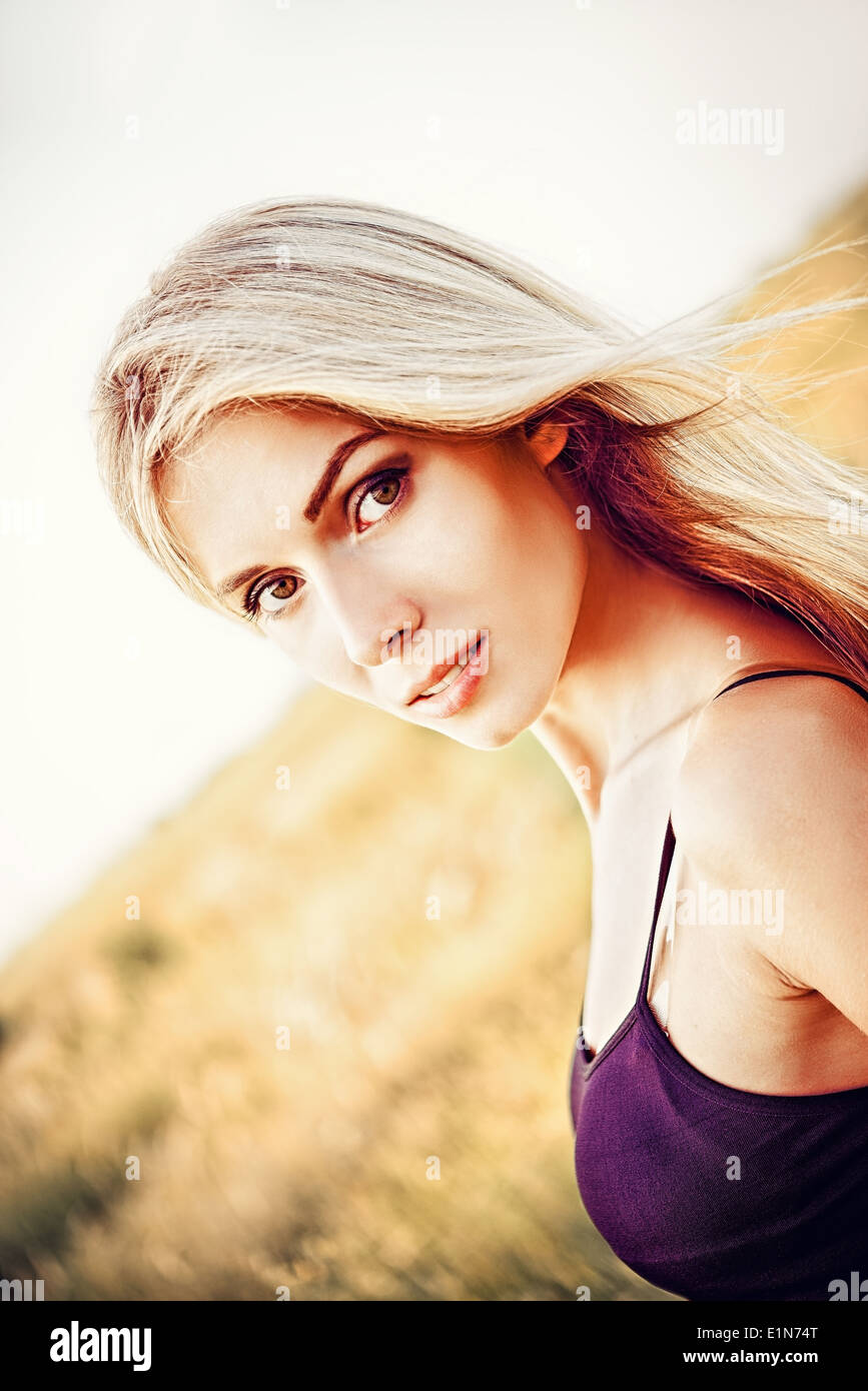 Outdoor closeup portrait of a beautiful young woman Stock Photo - Alamy
