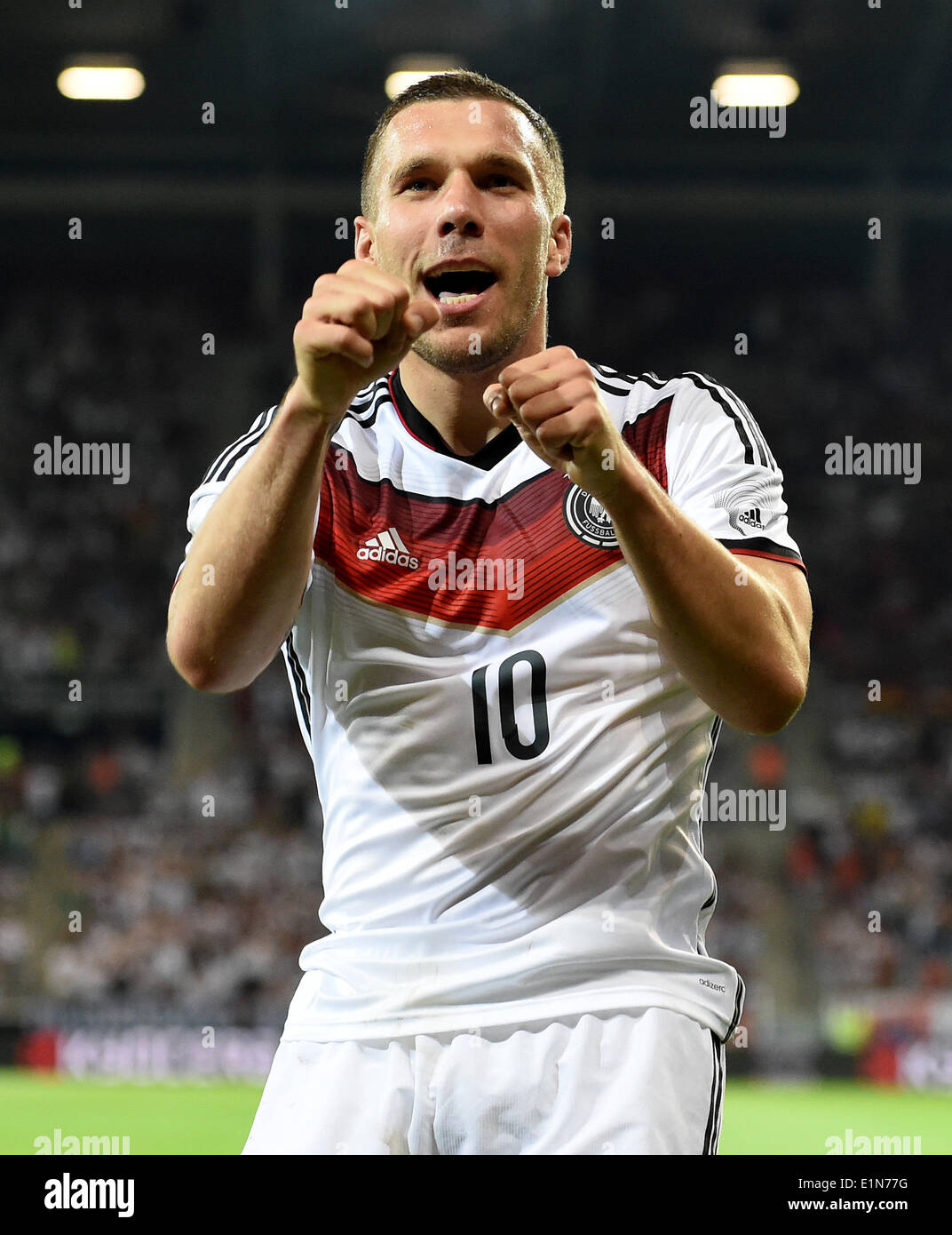 Mainz, Germany. 06th June, 2014. Germany's Lukas Podolski in action during the international friendly match between Germany and Armenia at Coface Arena in Mainz, Germany, 06 June 2014. Photo: Thomas Eisenhuth/dpa/Alamy Live News Stock Photo