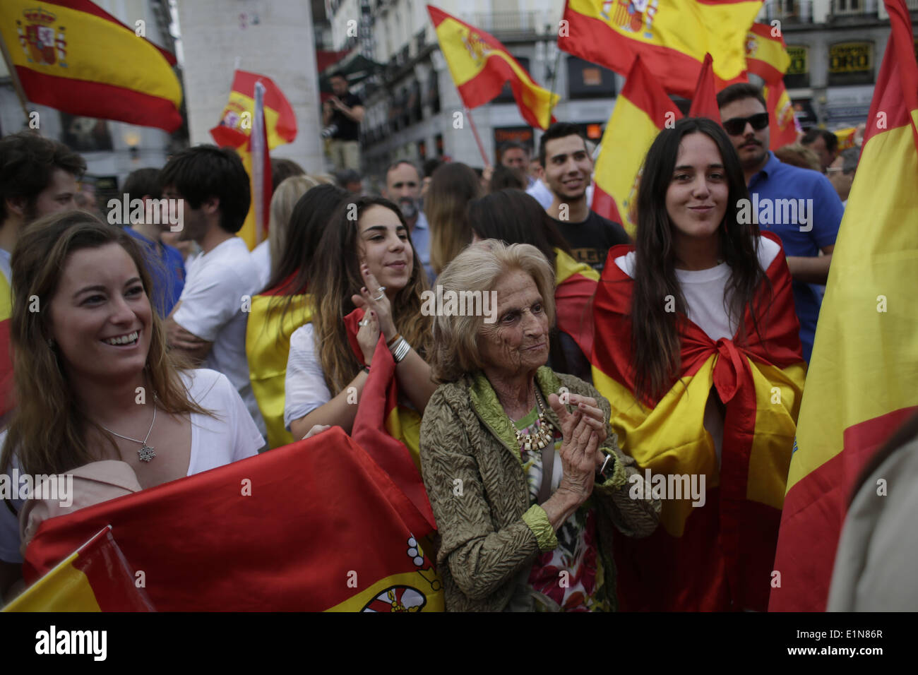Madrid, Spain. 6th June, 2014. Protestors shout slogans, laugh and wave