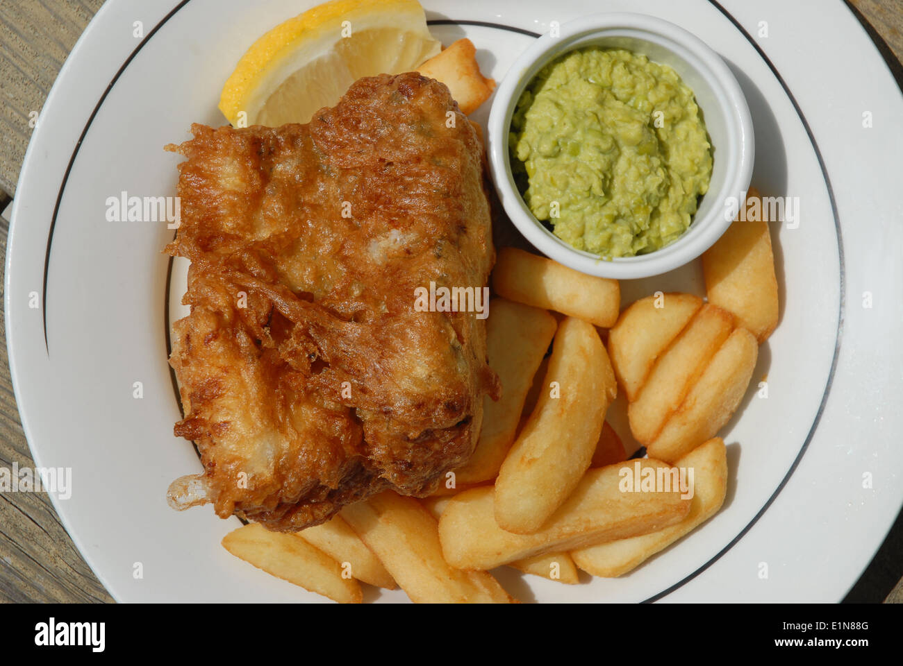 Fish, chips, and mushy peas Stock Photo Alamy