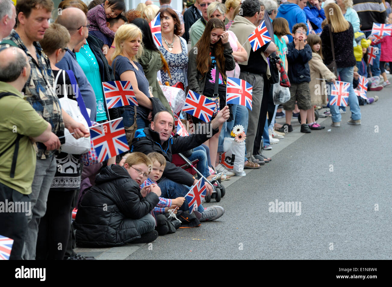 Maidstone, Kent, England. Civic Day Parade to honour the election of the new Mayor of Maidstone, Councillor Richard Thick. A military parade through the town is followed by a service at All Saints Church. Crowds lining the route, waiting for the precession Stock Photo