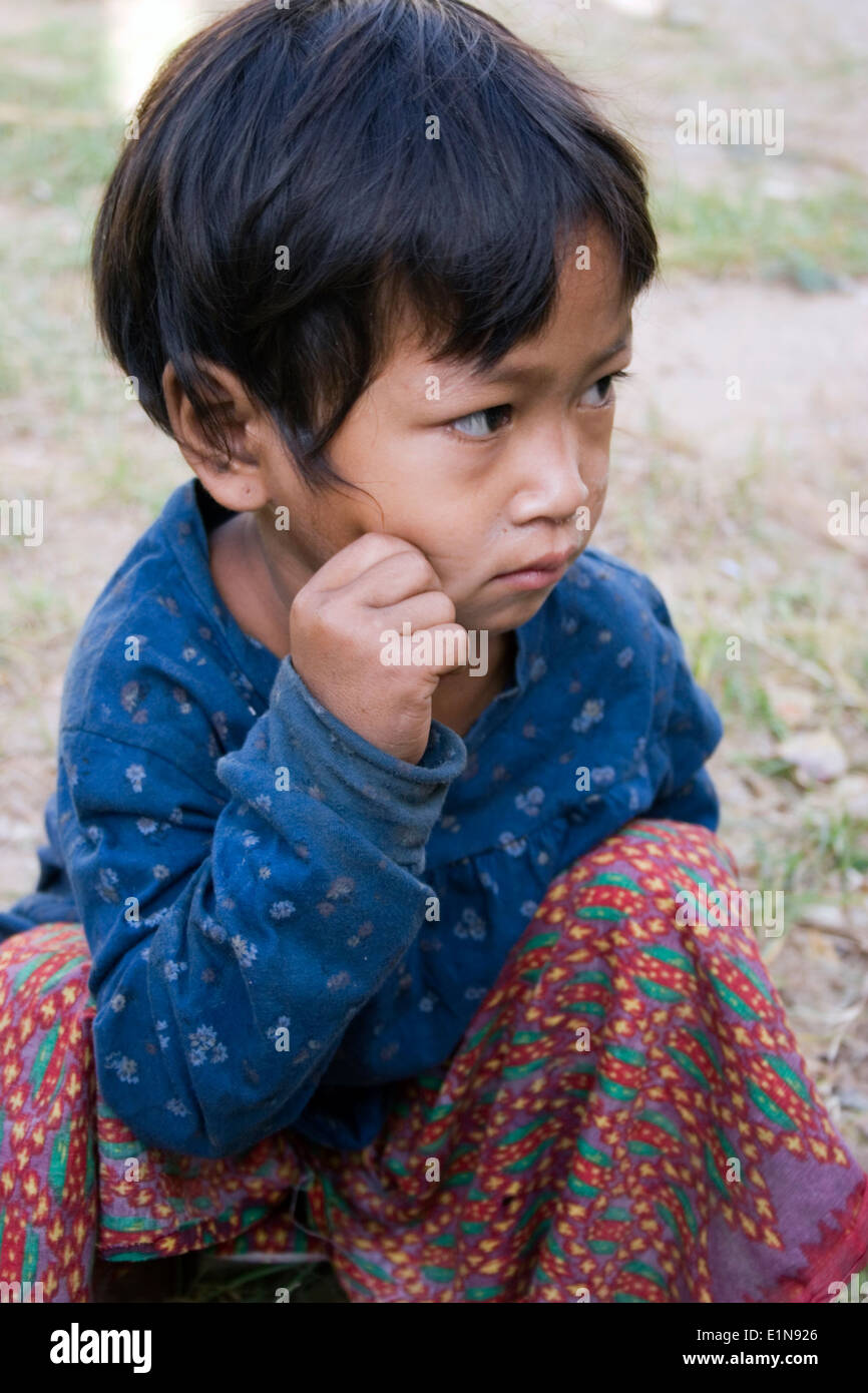 A young girl is enjoying her day in the rural village of Ban Russei, Kampong Cham Province, Cambodia. Stock Photo