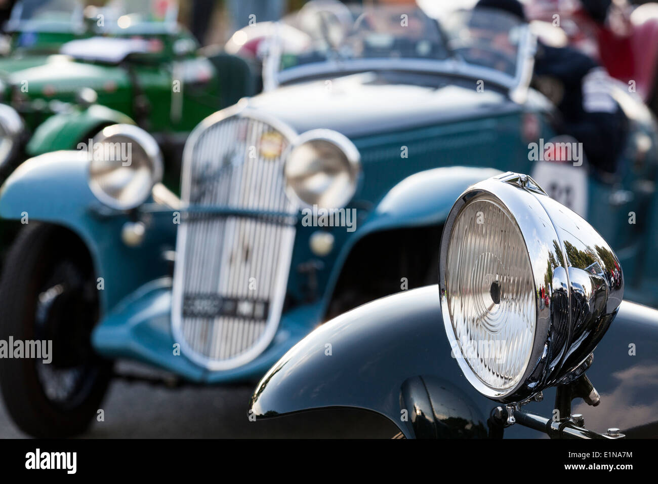 detail of cars competing in the mille miglia classic car road rally in