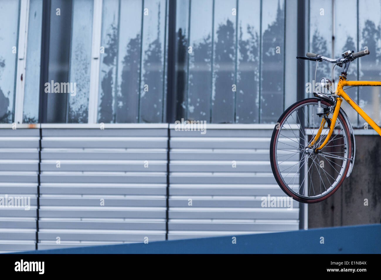 Partial frame of a bike suspended above the CERN bike rental office, Geneva Stock Photo