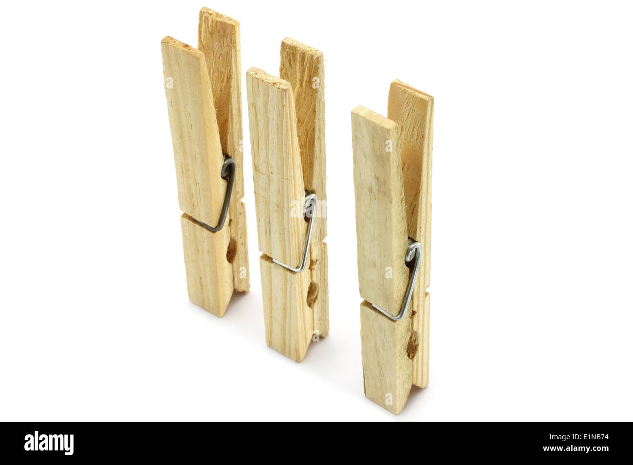 Three clothespins closeup on a white background Stock Photo Alamy