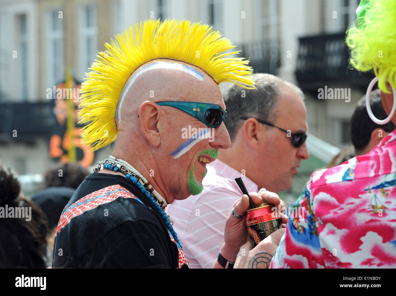 Brighton Sussex UK 7 June - Thousands of people enjoy the good weather the music and the food at Kemp Town Carnival in Brighton today The Kemp Town Carnival is one of Brighton’s largest free community street festivals, set in the heart of Kemp Town Village Credit:  Simon Dack/Alamy Live News Stock Photo