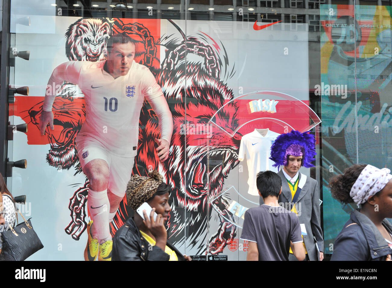 Oxford Street, London, UK. 7th June 2014. JD Sports window with a picture of Wayne Rooney ahead of the World Cup. Credit:  Matthew Chattle/Alamy Live News Stock Photo