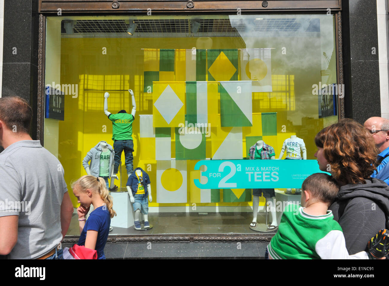 Oxford Street, London, UK. 7th June 2014. GAP Kids window with Brazil flags and T Shirts, ahead of the World Cup. Credit:  Matthew Chattle/Alamy Live News Stock Photo