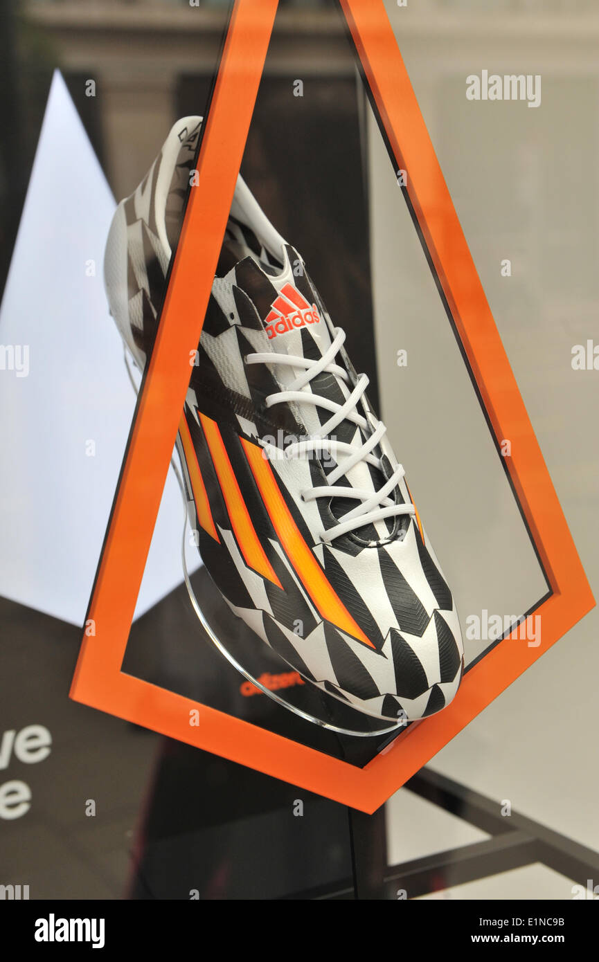 Oxford Street, London, UK. 7th June 2014. Adidas store with World Cup F10  FG Battle boots, ahead of the World Cup in Brazil. Credit: Matthew  Chattle/Alamy Live News Stock Photo - Alamy