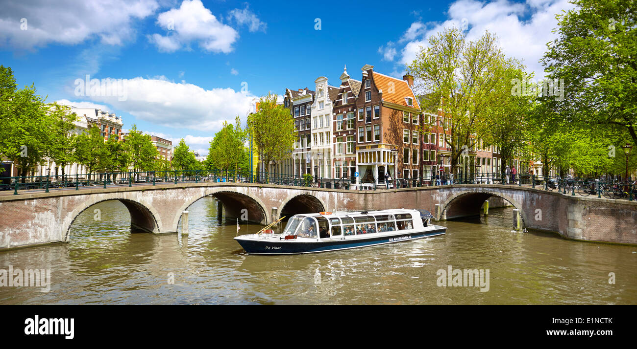 Boat tour on the Amsterdam Canal - Holland Netherlands Stock Photo