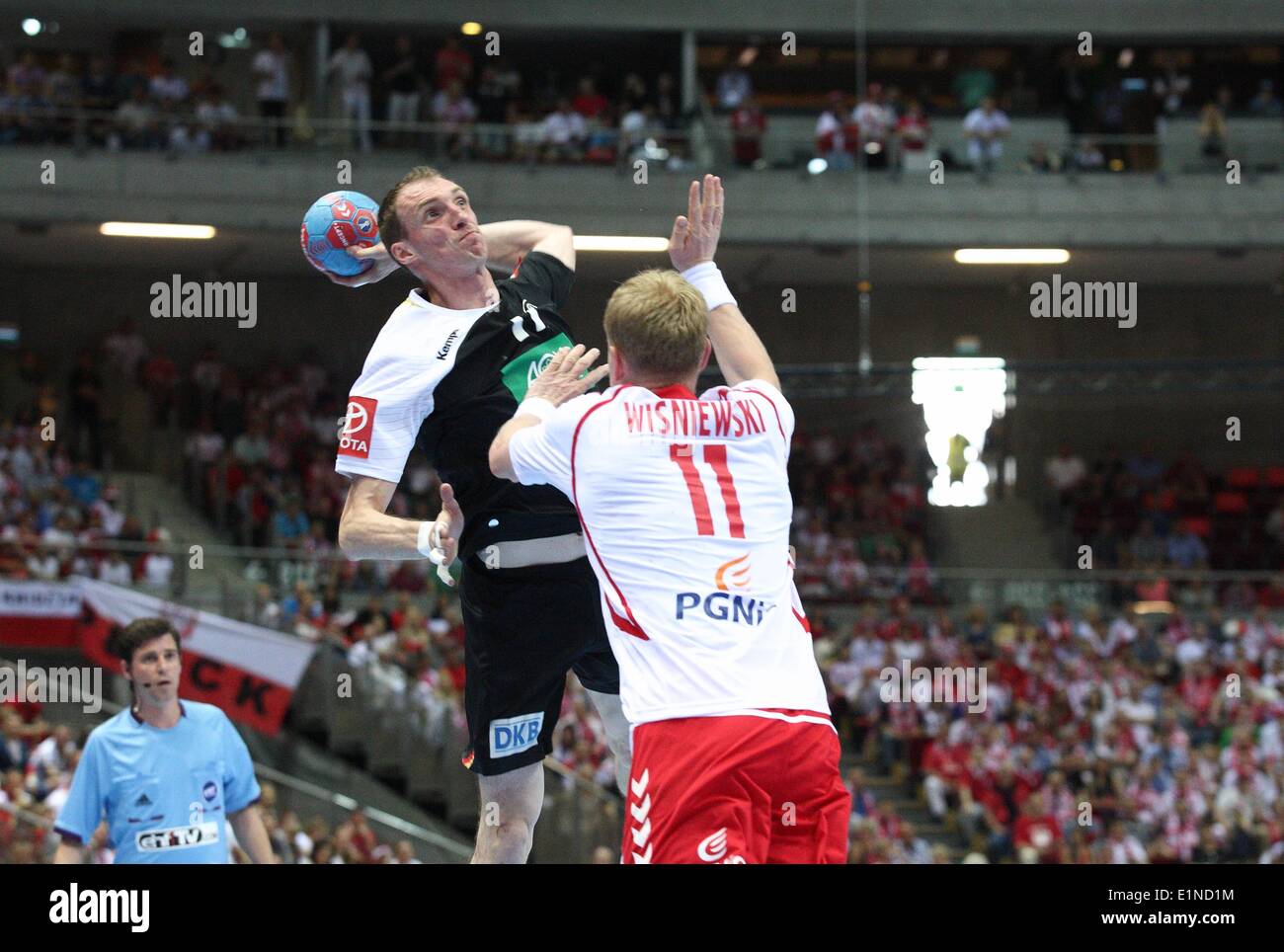 Gdansk, Poland 7th, June 2014 Quatar 2015 Men's World Handball Championship Play Off game between Poland and Germany at ERGO Arena sports hall. Holger Glandorf (11 black) in action during the game. Credit:  Michal Fludra/Alamy Live News Stock Photo