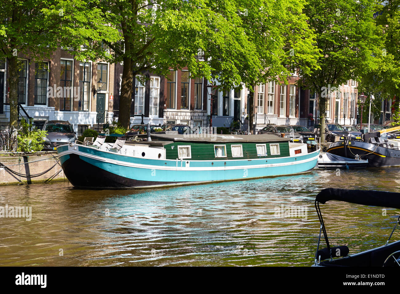 Houseboat barge, Amsterdam canal - Holland Netherlands Stock Photo