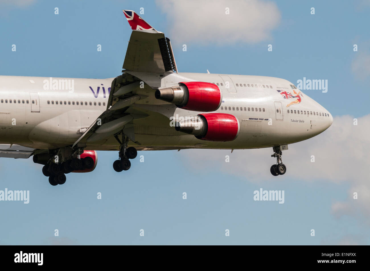 Side view of the front and wings of a Virgin Atlantic Airlines Boeing 747 on approach to land Stock Photo