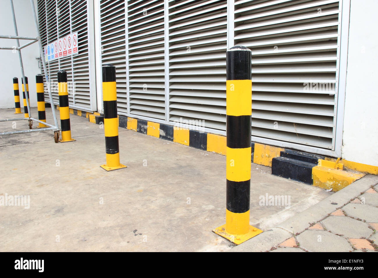 Yellow black striped road construction hires stock photography and