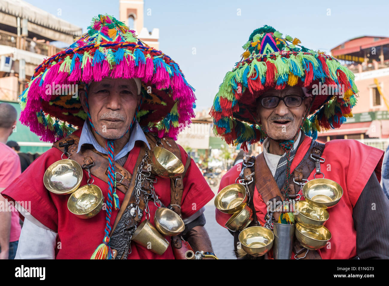 Old men dressed in colourful national costume for tips in Jeema el-Fnaa  square, Kasbah, Marrakech, Morocco Stock Photo - Alamy